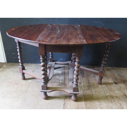 1402 - An Oak Barley Twist Gate Leg Table, 92x137cm