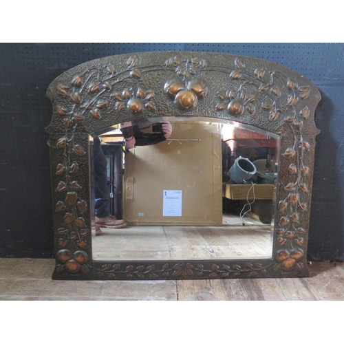 1437a - An Art Nouveau Copper Mirror with embossed fruiting foliate work, 106cm width x 89cm height