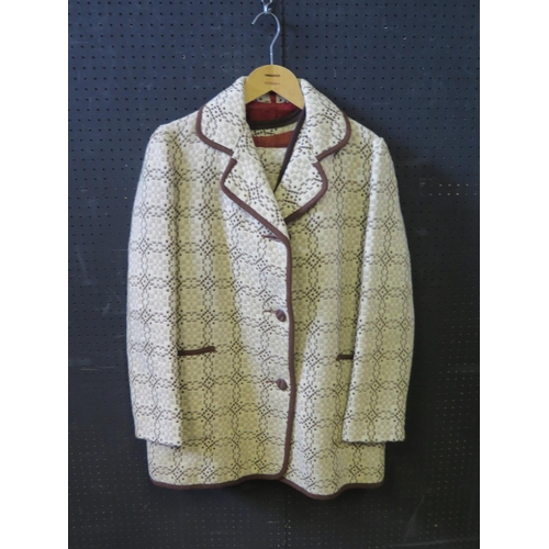 1441 - A Ladies Hand Made Tweed Jacket with matching skirt