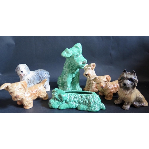 1532 - Five Sylvac Terrier Ornaments, largest 19.5cm and two other dogs