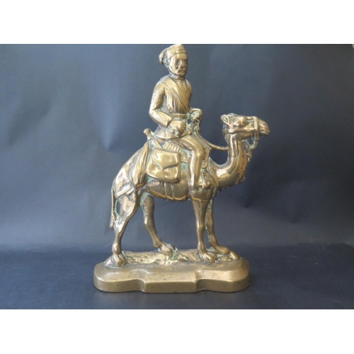 1555 - A Victorian Cast Brass Flatback of Sudan Campaign Camel with Rider, 29cm high