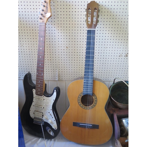 1574 - An HOKADA Model 3151 Classical Guitar and Rocket Deluxe electric guitar (A/F)