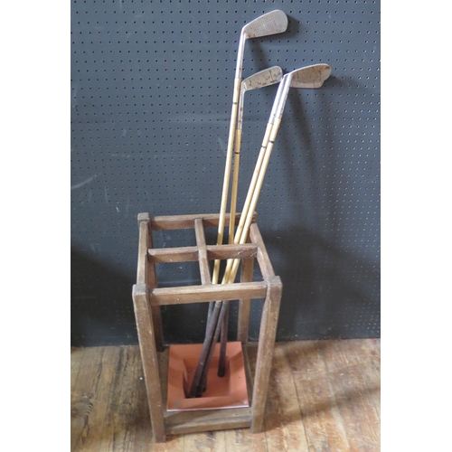 1624 - Four Sure Shot Special Golf Clubs and umbrella stand