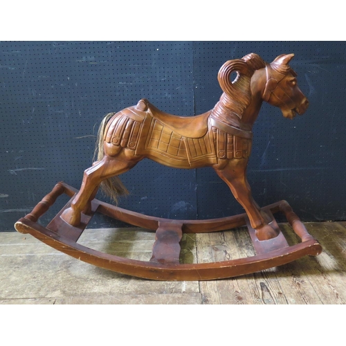 1808 - A Carved Hardwood Rocking Horse, 81cm high