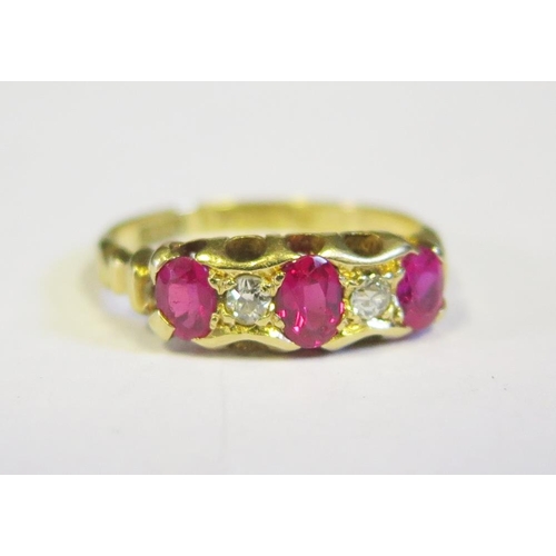 235 - An 18ct Gold, Ruby and Diamond Five Stone Ring, size N.5, 3.4g