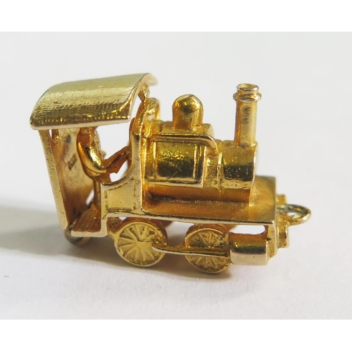 263 - A 9ct Gold Steam Locomotive Charm with hinged cab, 4.8g