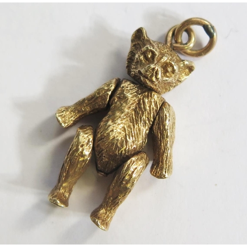 266 - A 9ct Gold Teddy Bear Charm with articulated head and limbs, 29mm, 6.8g