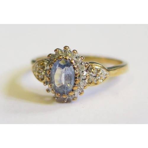 285 - A 10K Gold, Blue Topaz and Diamond Ring, size N, 2.7g