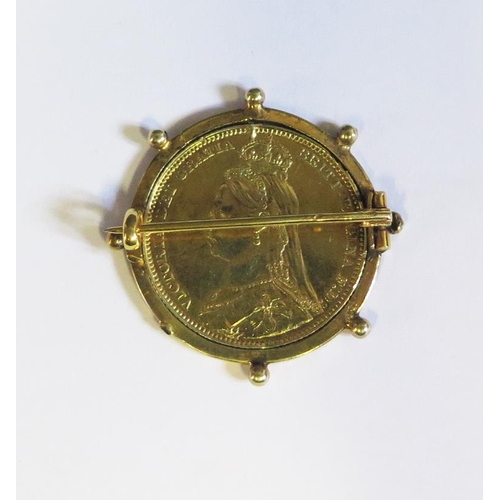 29 - A Victorian Silver Gilt Shilling Revolving Coin Brooch