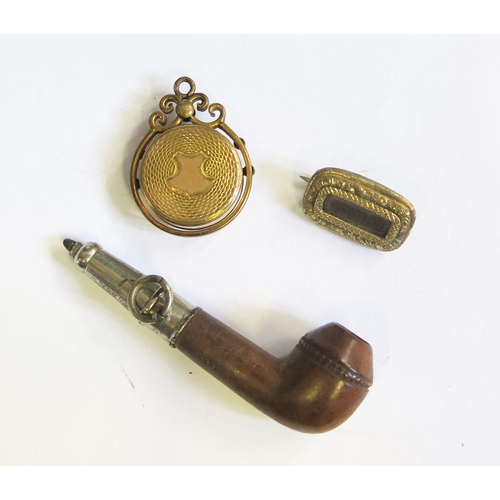 296 - A Fob Pencil in the form of a tobacco pipe (55mm), 19th century memorial brooch and fob compass