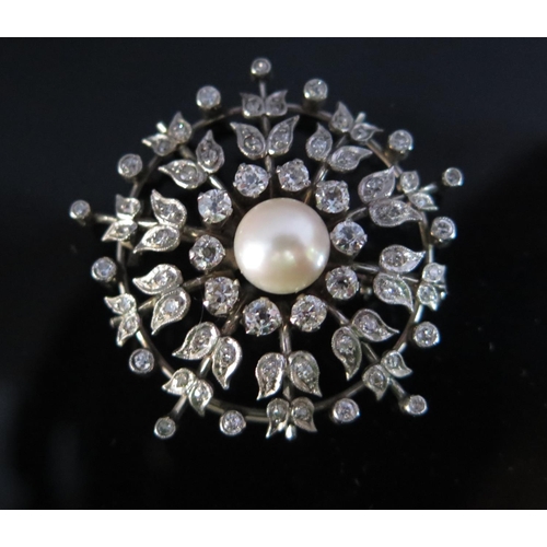 313 - A Victorian Pearl and Diamond Pendant Brooch in an unmarked precious white metal setting, pearl 8.5m... 