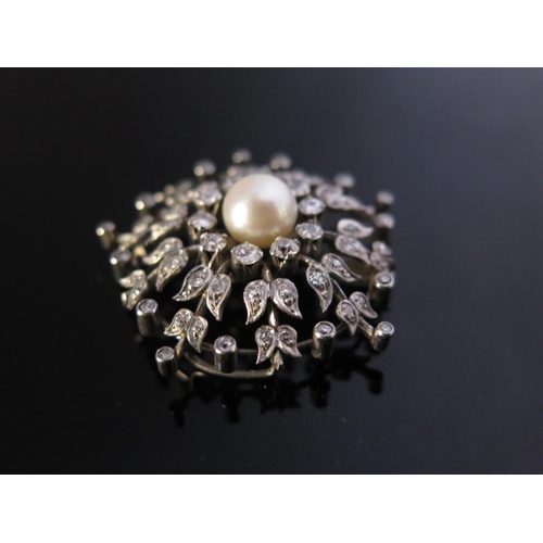 313 - A Victorian Pearl and Diamond Pendant Brooch in an unmarked precious white metal setting, pearl 8.5m... 