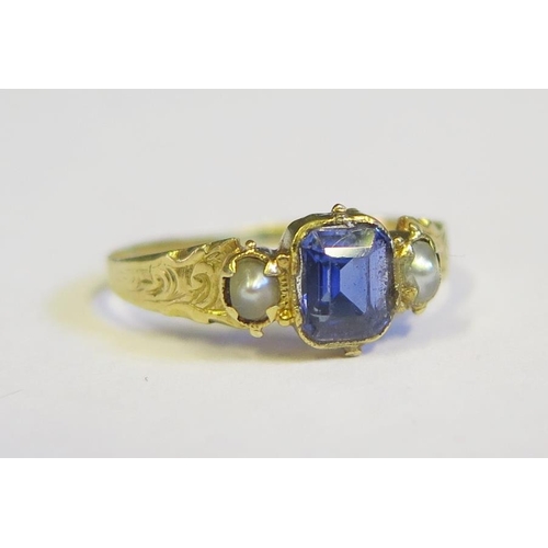 314 - A Boxed 19th Century Sapphire and Pearl Ring with chased foliate shoulders and in an unmarked high c... 