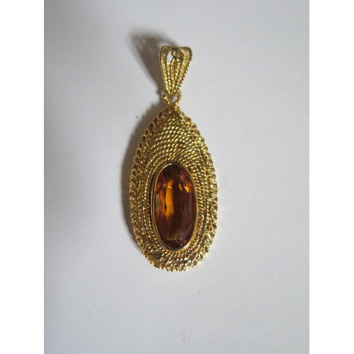 348 - An 18ct Gold and Orange Stone Set Pendant, 49mm, 6.9g