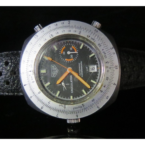 490 - An HEUER Automatic Calculator Wristwatch with Cal. 15 movement, fluorescent orange hands and rare or... 