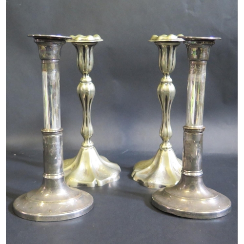 511 - A Pair of Victorian Silver Plated Candlesticks with chased foliate decoration and one other pair A/F