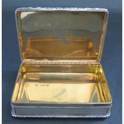 552 - A Large William IV Silver and Gilt Lined Snuff Box with raised foliate scroll borders, engine turned... 