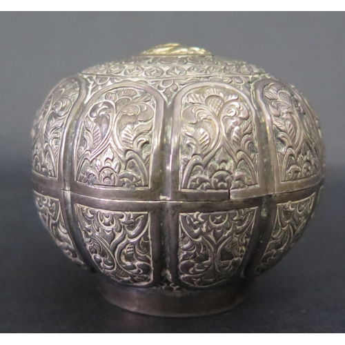 612 - An Asian White Metal Shaped Ovoid Box with yellow metal top, 6.5cm diam., 50g