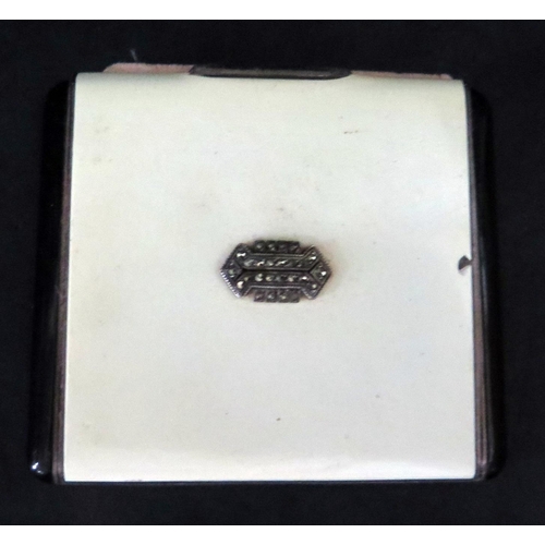 698 - A Deco Silver and Enamel Compact with marcasite decoration, London import marks 1934, 85g