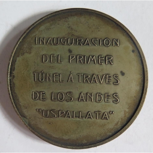 722 - An Argentinian 1910 Andes Tunnel Inauguration Medallion in leather sleeve UNDERSOLD LOTS ADJUSTMENT