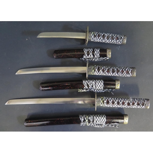 915 - A Set of Three Japanese Style Miniature Swords, largest 34cm including scabbard