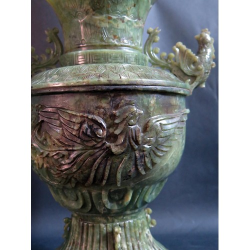 1029A - A Chinese Carved Jadeite Vase Decorated with Fenghuang, 33.5cm. Foot restored