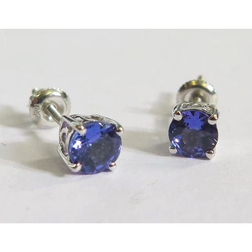 302 - A Pair of 18ct White Gold and Tanzanite Stud Earrings, 1.4g, stones 5mm