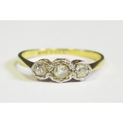 304 - An 18ct Gold Three Stone Diamond Ring, size O, 2.1g