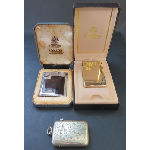 574 - A Calibri Benson & Hedges Cased Lighter (working), Ronson lighter (not tested) and silver plated ves... 