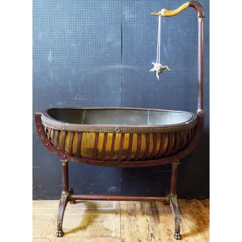 1432 - An Empire Period Rosewood Cradle in country house condition, 125cm long