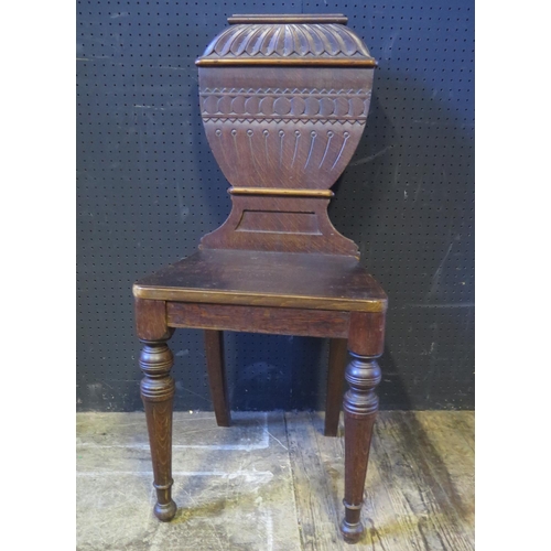 1469 - A Victorian Carved Oak Hall Chair