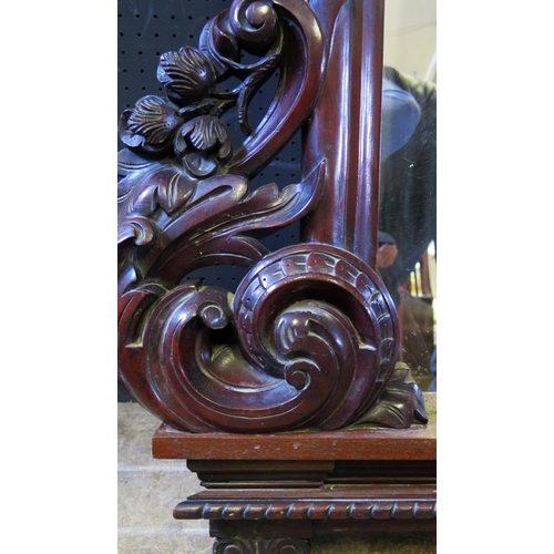 1464 - A Victorian Carved Mahogany Overmantle Mirror with foliate scroll decoration, 181(w)x127(h)cm