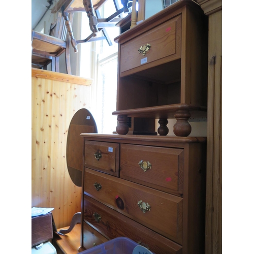 1521 - A Modern Pine Bedroom Suite comprising dressing table chest of drawers and bedside chest, also a swi... 