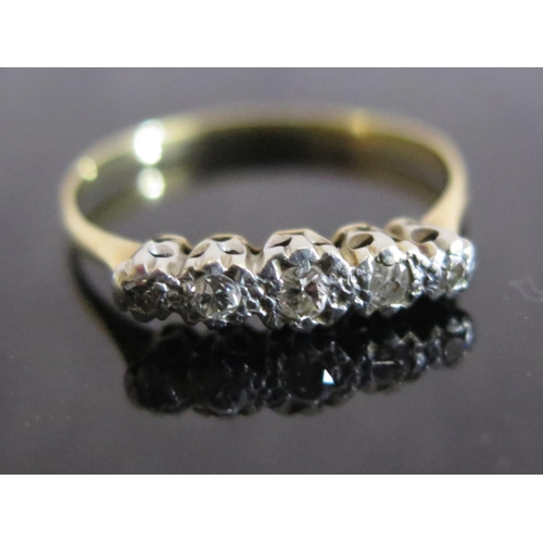 173 - A Diamond Five Stine Ring in an unmarked gold setting, size P.5, 1.9g