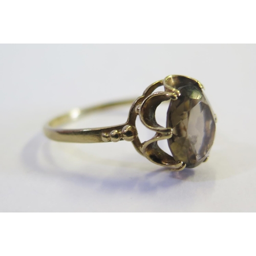 183 - A 9ct Yellow Gold and Smoky Quartz Dress Ring, size S, 1.9g