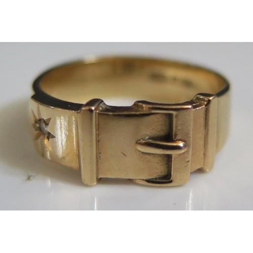 218 - A 9ct Gold and Diamond Buckle Ring, size Q.5, 5g