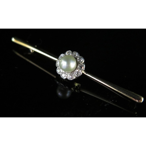 241 - A Pearl and Diamond Bar Brooch in an unmarked high carat gold setting, 12mm head, 60mm wide, 5g