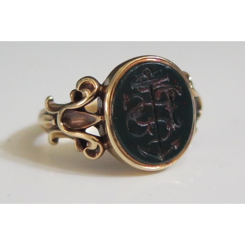 258 - An Antique 15ct Gold and Bloodstone Ring carved with anchor and initials TS, size N, 4.2g