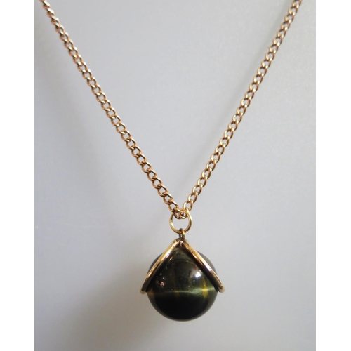 274 - A 9ct Gold Chrysoberyl or Catseye Ball Pendant on 78cm 9ct gold chain, 11.2g chain, 9.1g pendant