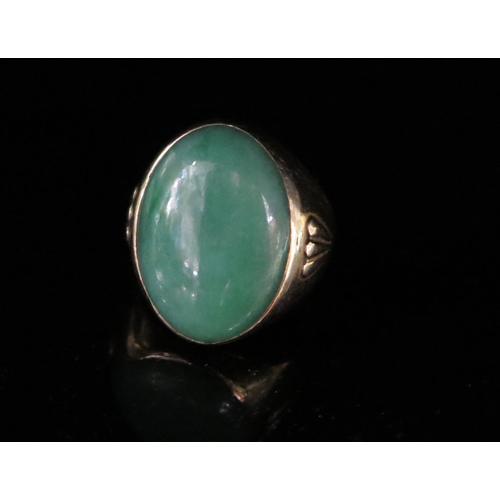 276 - A 14K Gold and Jadeite Ring, 23x17mm stone, size O, 12g