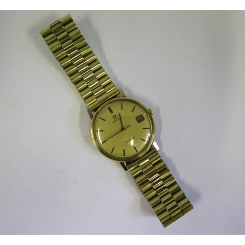 386 - An Omega Gent's Wristwatch in a gold or gold plated case, boxed and with papers dated 1973, movement... 