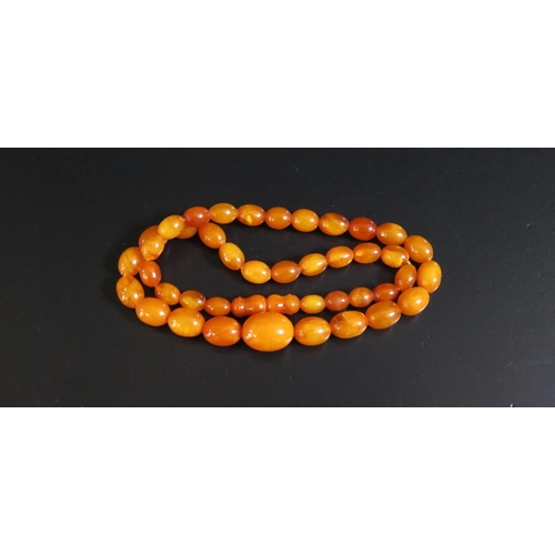 142 - A Baltic Amber Graduated Bead Necklace, 47cm, largest 18x13mm