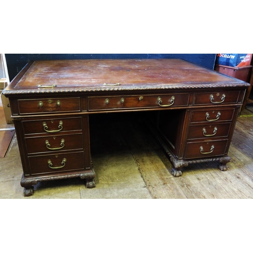 1463 - A Heaton Tabb & Co. Mahogany Partner's Desk Partner's Desk with gadrooned top and ball and claw feet... 