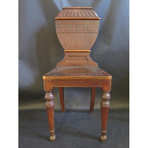 1469 - A Victorian Carved Oak Hall Chair