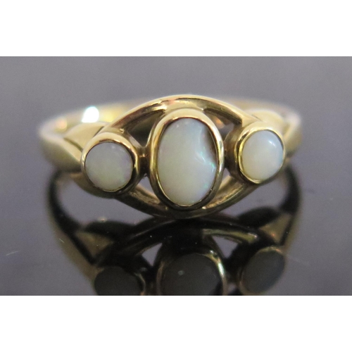 175 - A 9ct Gold and Opal Three Stone Ring, size M, 2.3g. A/F