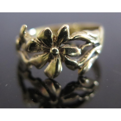 176 - A 9ct Gold Flower Ring, size O.5, 2.5g