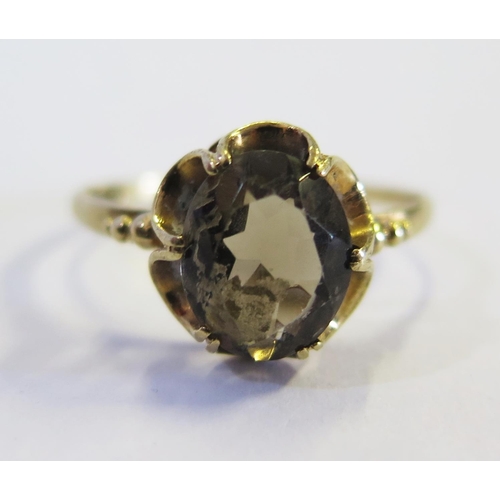 183 - A 9ct Yellow Gold and Smoky Quartz Dress Ring, size S, 1.9g