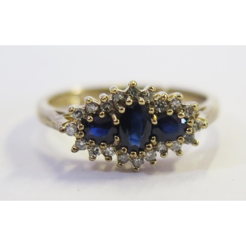 186 - A 9ct Yellow Gold, Sapphire and Diamond Ring, size P, 2.6g