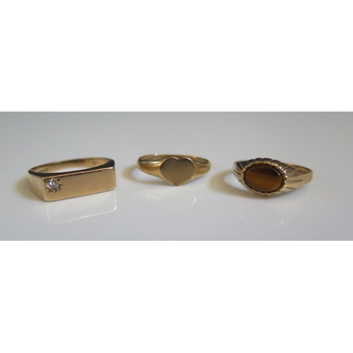 197 - A 9ct Gold and Diamond Ring (size O, 3.1g), 9ct gold and tiger's eye ring (size L.5, 1.9g) and 9ct g... 