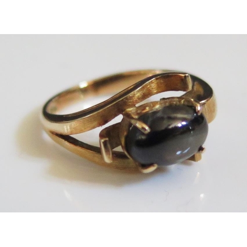 201 - An 18K Gold and Star Sapphire Ring, size L, 4.1g